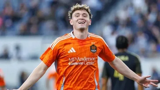 Jack McGlynn #8 of Houston Dynamo FC celebrates after scoring a goal during an MLS match against LAFC on May 10, 2026 at BMO Stadium in Los Angeles, California.